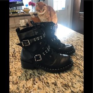 Black “combat” boots with stud trim